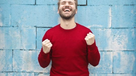 happy-feeling-man-in-red-jumper